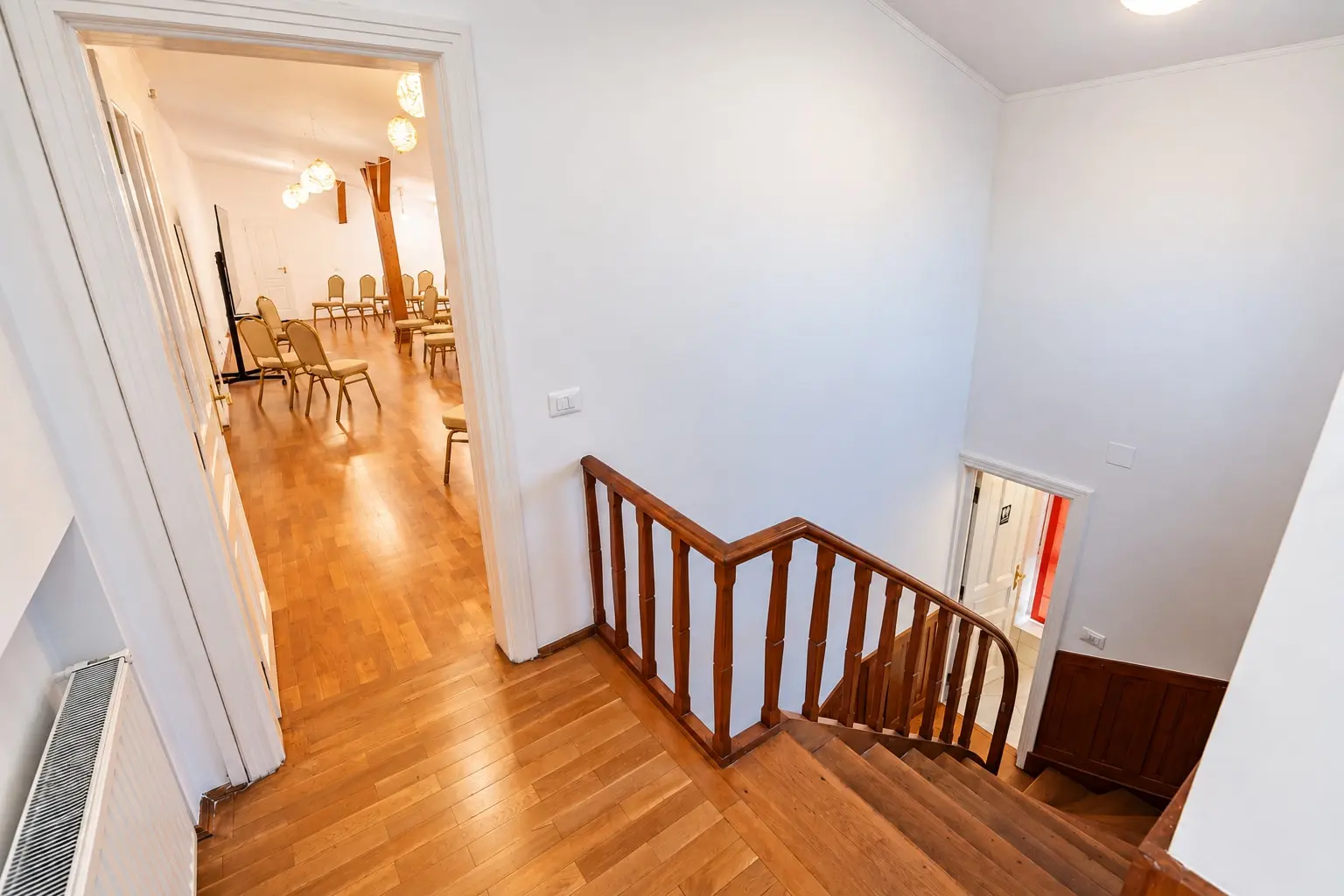 Warm Wood Stairway to Event Room
