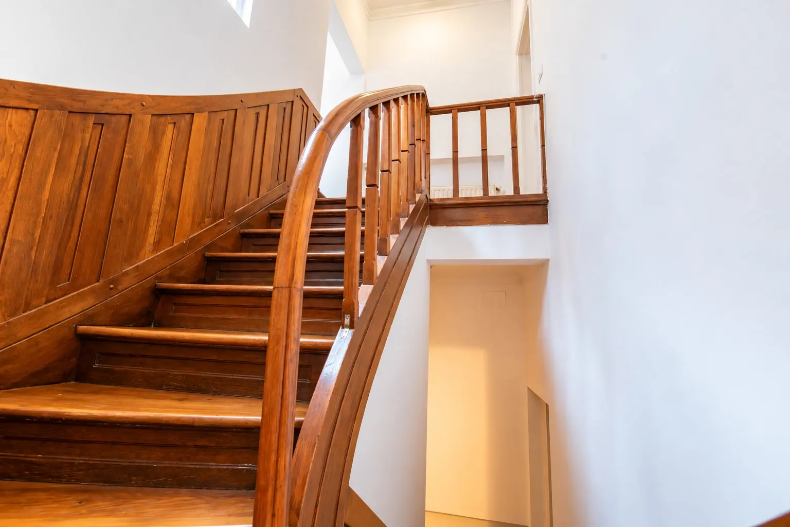 Warm Wooden Staircase Landing