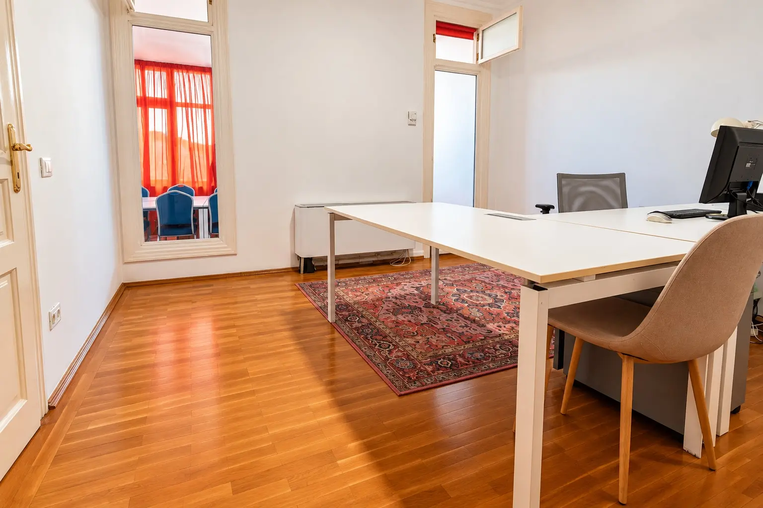 Warm Modern Office with Red Accent Curtains