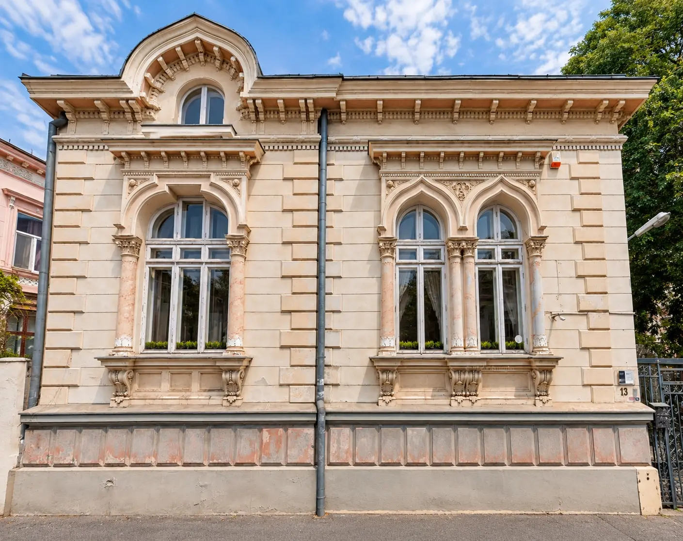 The ornate façade of the villa