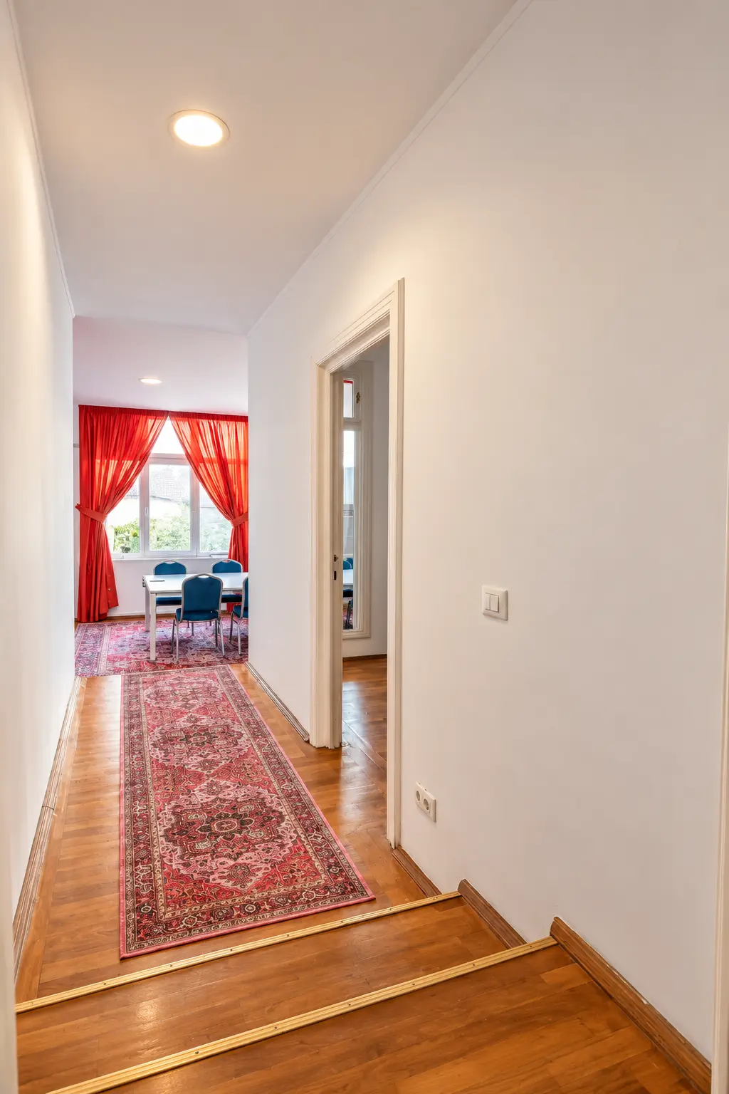 Studio is made by joining the Infinity and Boss rooms on the first floor: about 50 m², for about 10–12 people.